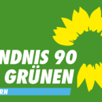 Logo von BÜNDNIS/DIE GRÜNEN Ortsverband Bönningstedt mit Sonnenblume und grünem Hintergrund